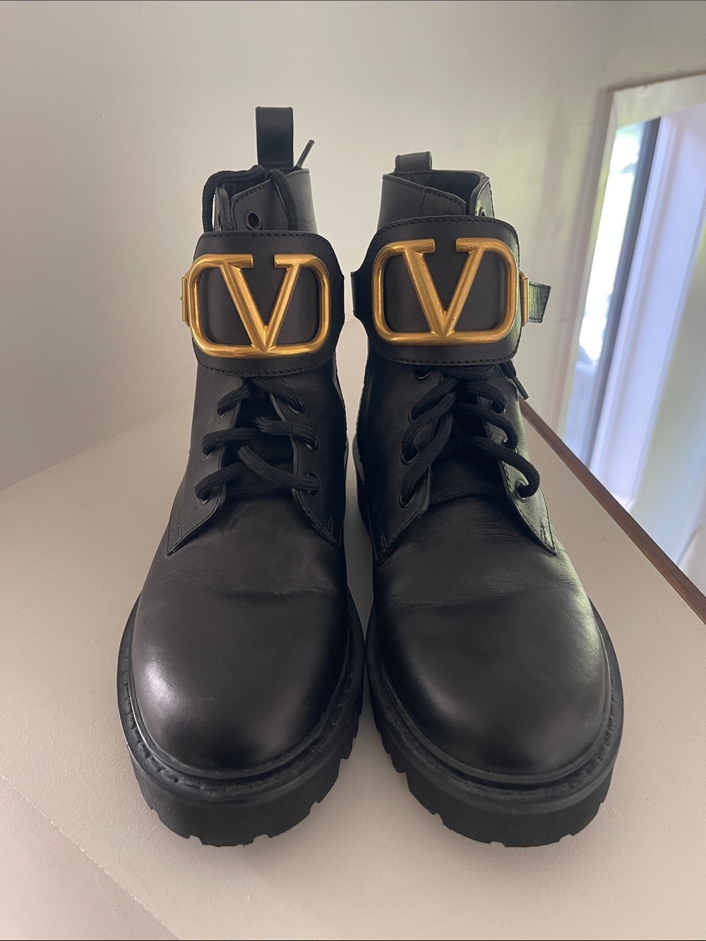 Valentino Black Leather Combat Boots with Gold V Buckles
